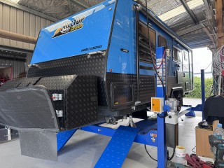 Hoist for Access Underneath Caravans